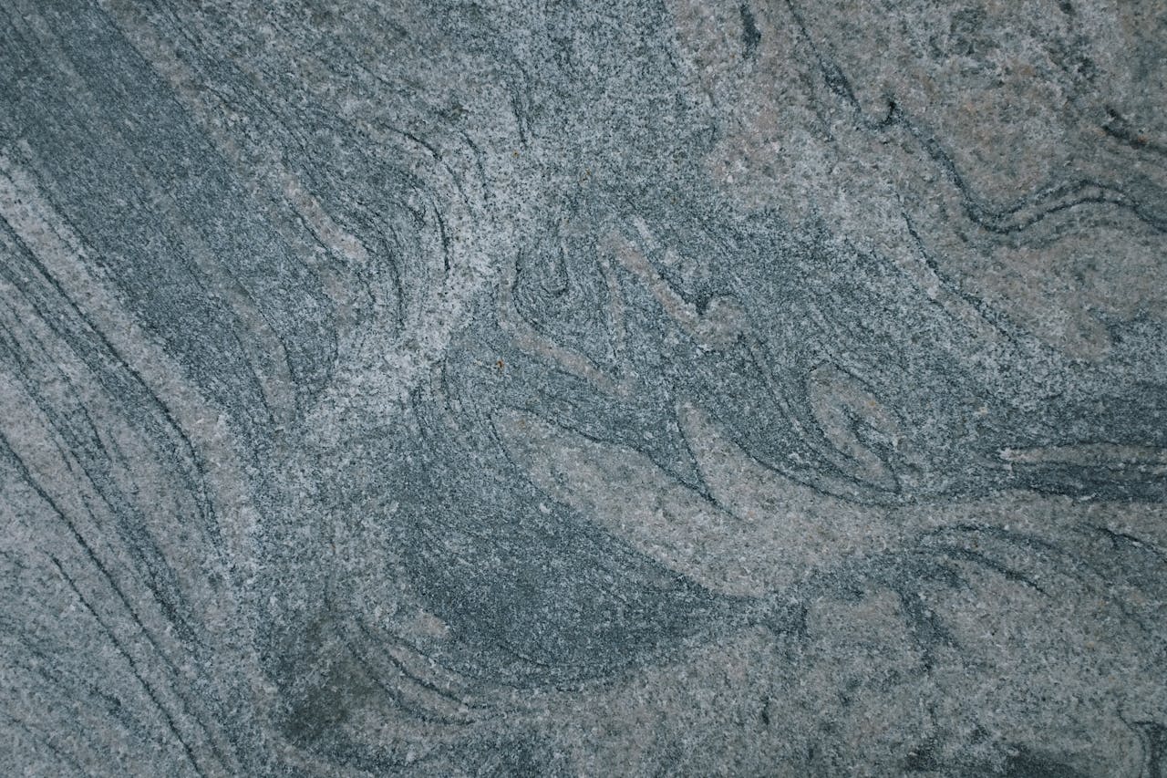 Intricate abstract texture of a stone surface with ample copy space for design projects.