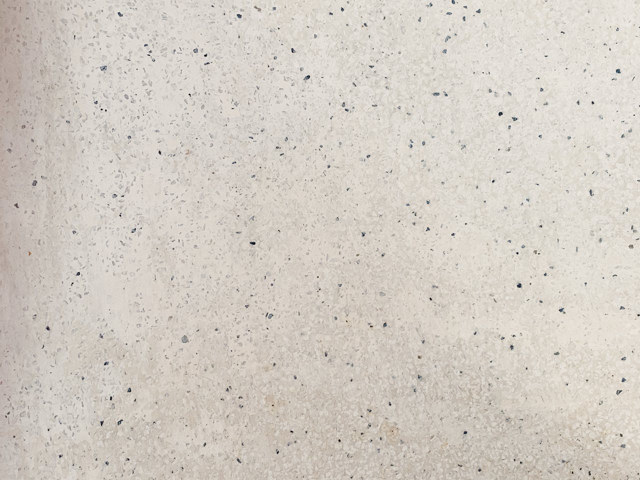 Close-up of a speckled granite surface showcasing natural texture and pattern.