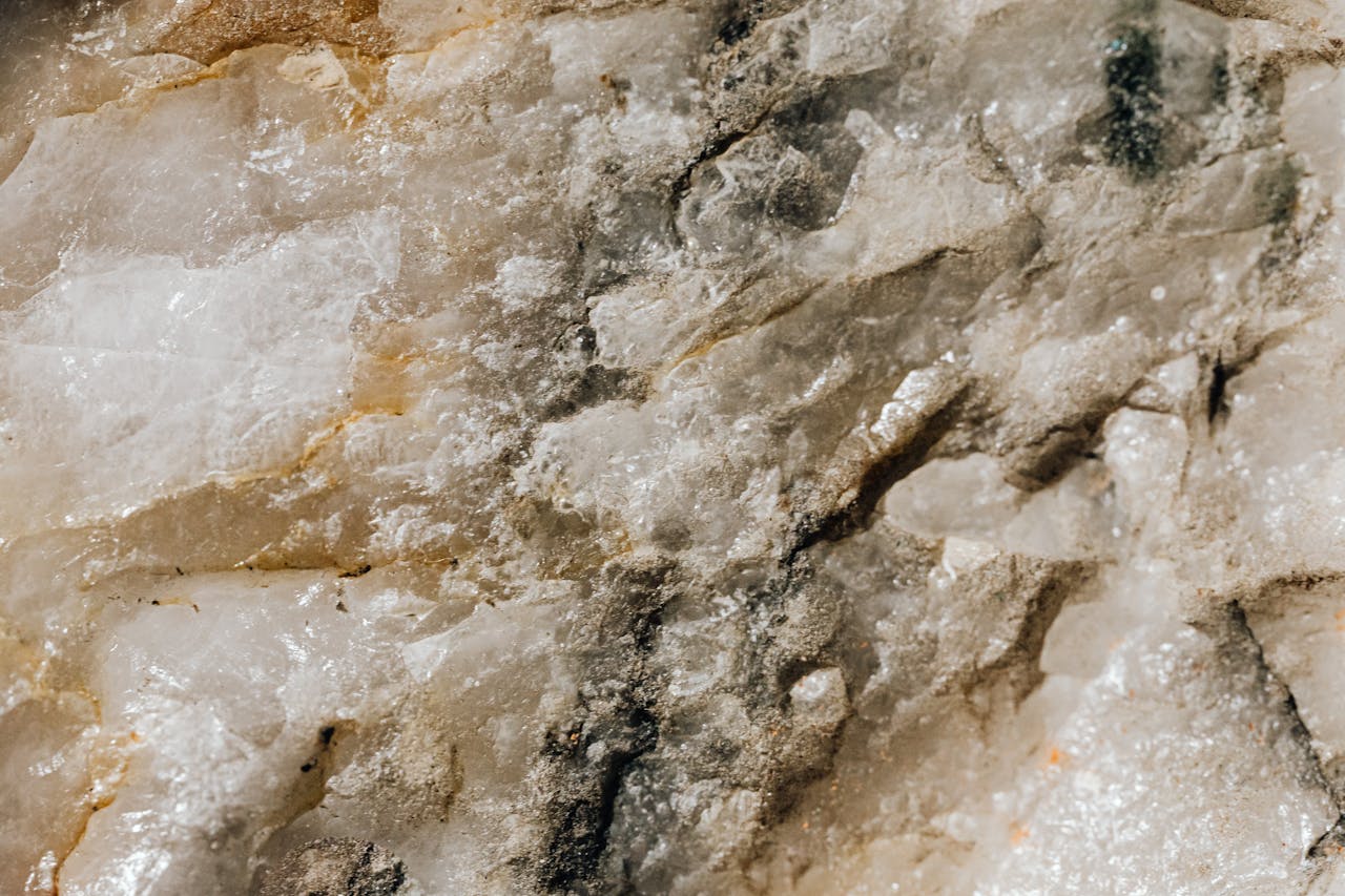 Close-up view of a textured mineral surface, showcasing intricate details and patterns.